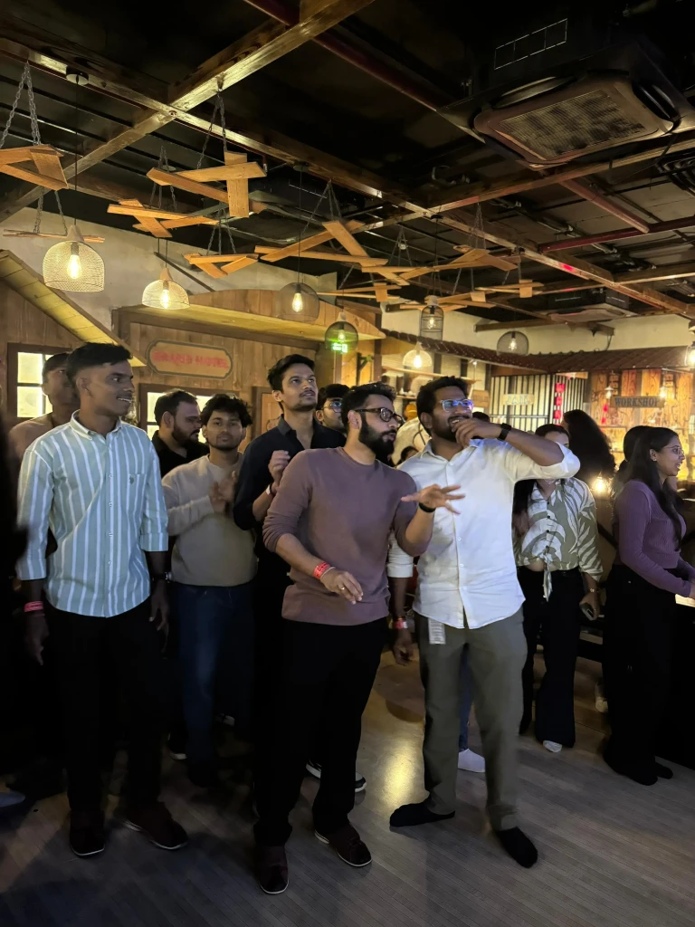 Team member bowling at strike night