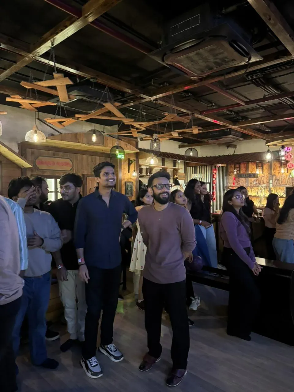 Team members posing at the bowling alley